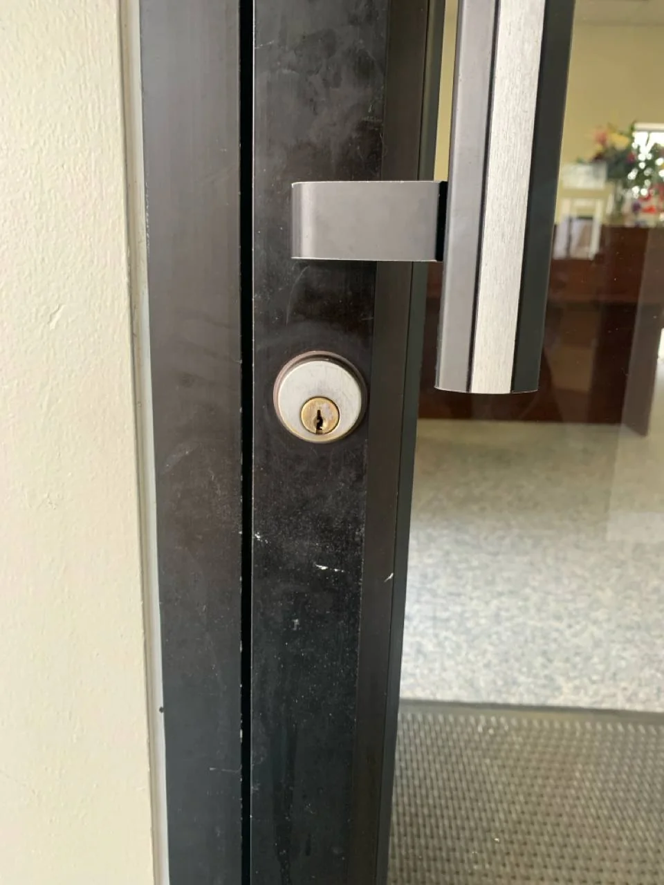 Locksmith safely unlocking a car door without damage after failed DIY attempt in Bowling Green Kentucky
