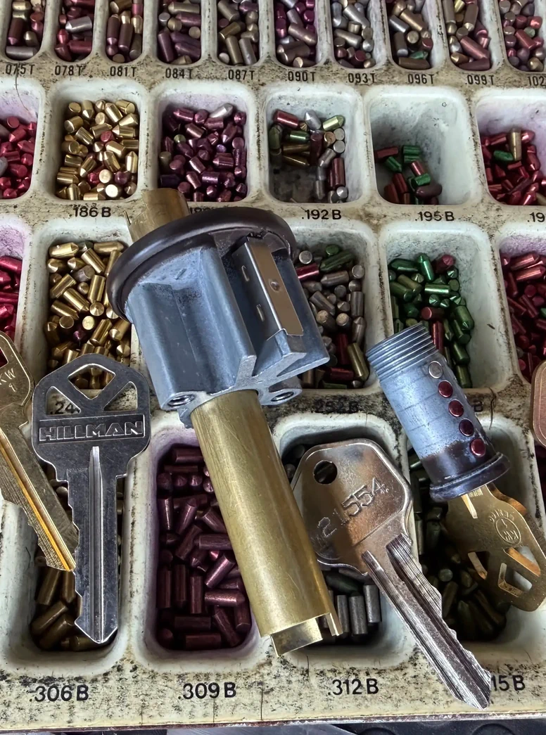 Lock rekey process showing pin tumbler system by residential locksmith in Bowling Green KY