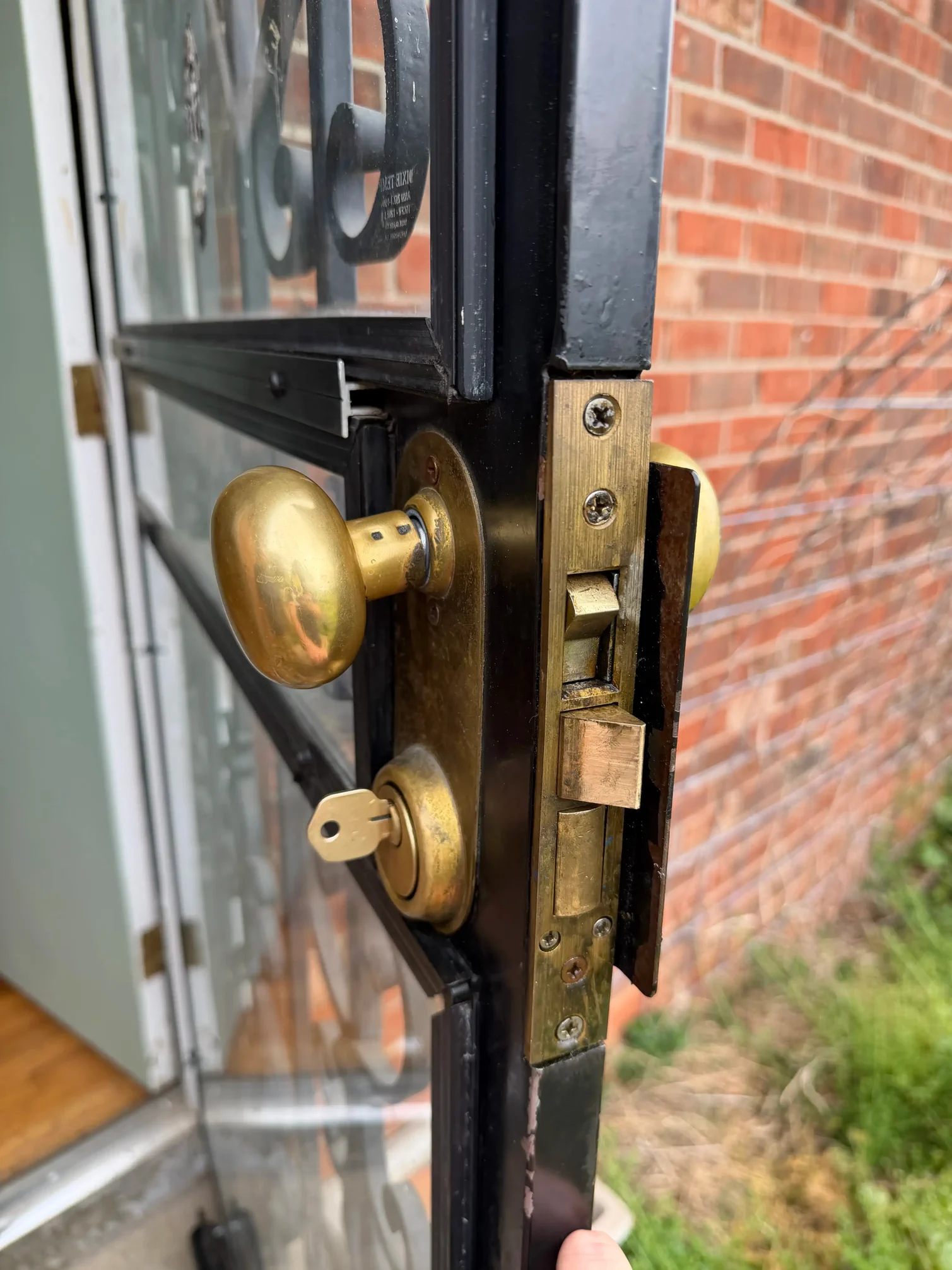 Locksmith repairing a stuck residential door lock that will not turn in Bowling Green Kentucky